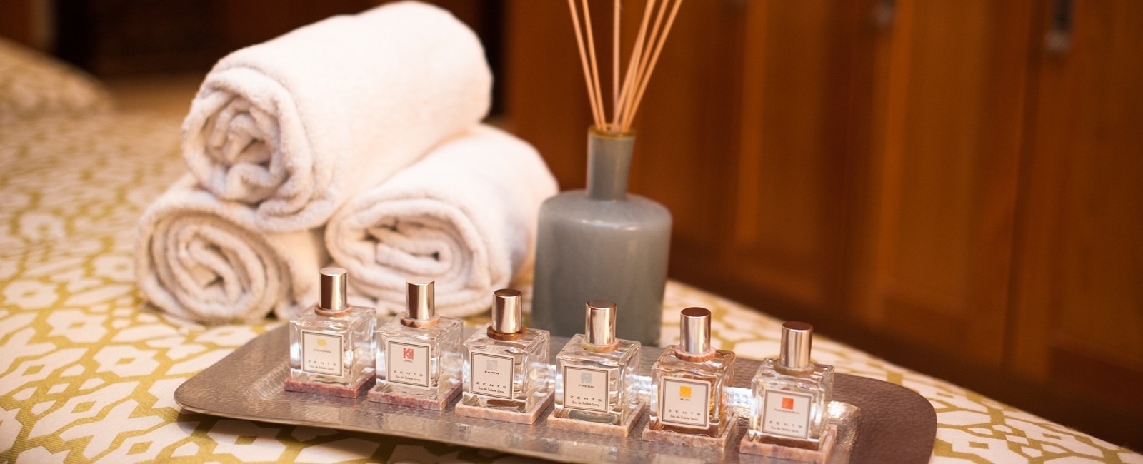 spa setup with essential oils and towels